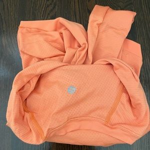 Brand new never worn Longesleeve swiftly. Crop length